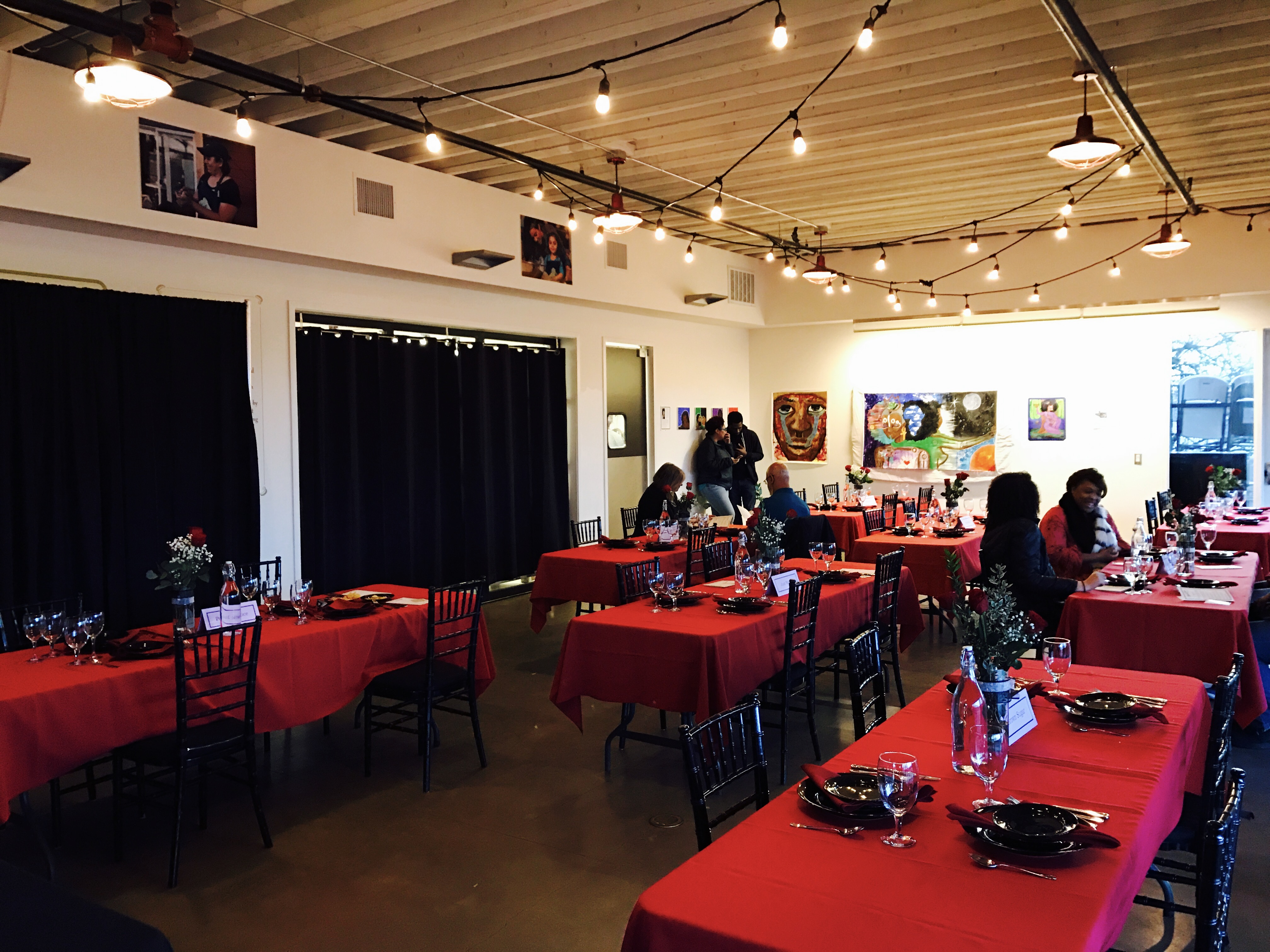 Red and black tablescapes set up for Valentine's Cooking Class & Dinner