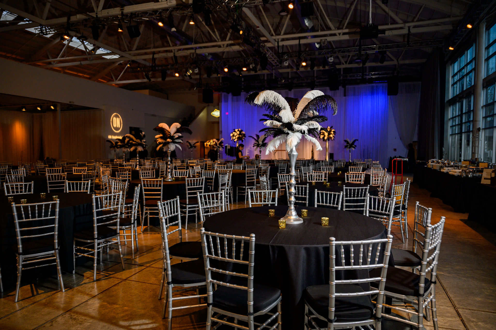 Corporate event space with black and white decorations