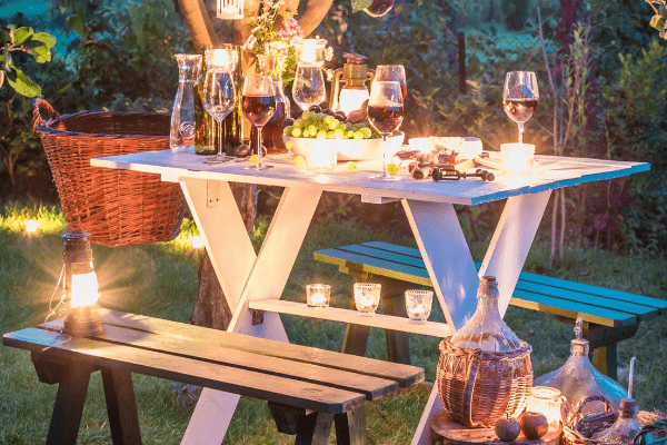 Elegant candlelit picnic setting