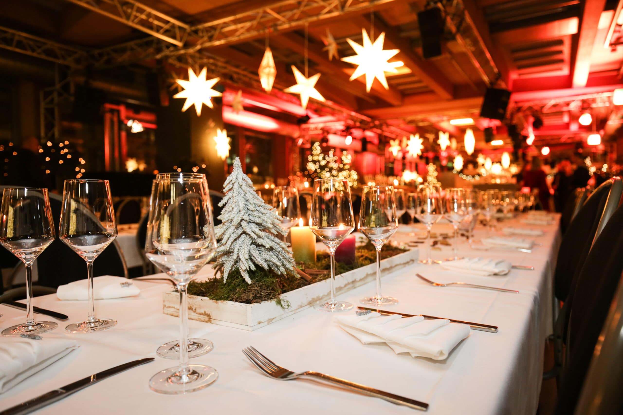 Table settings at a corporate holiday event