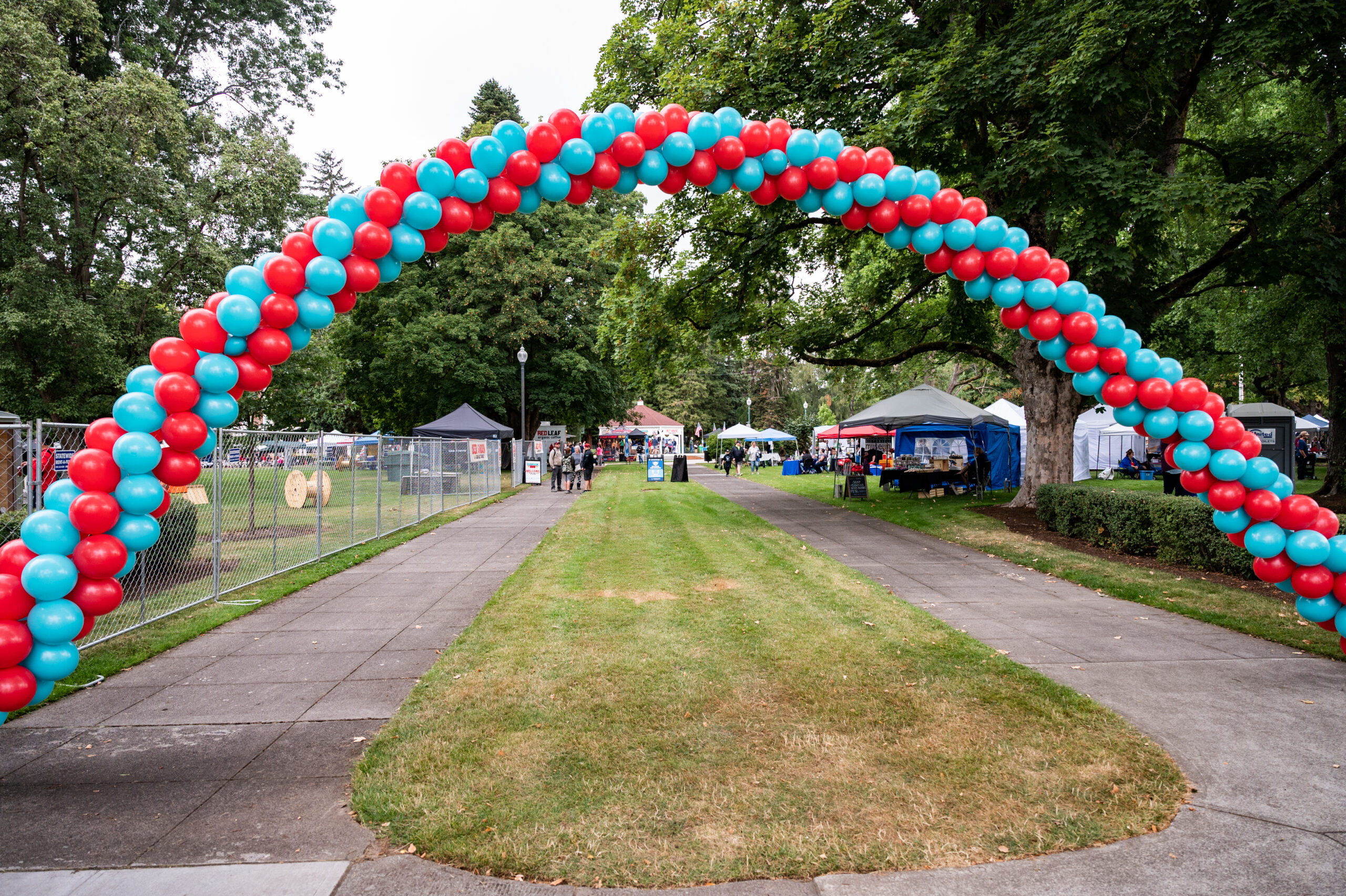 Red and blue balloon arch